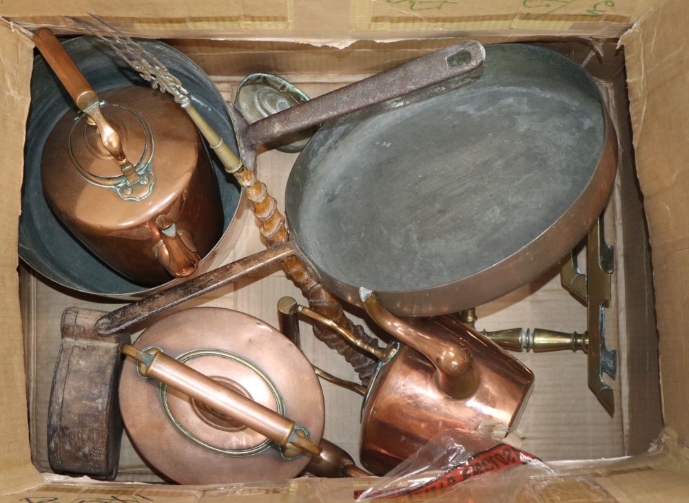 A collection of Victorian copper and brass items, including a large copper saucepan